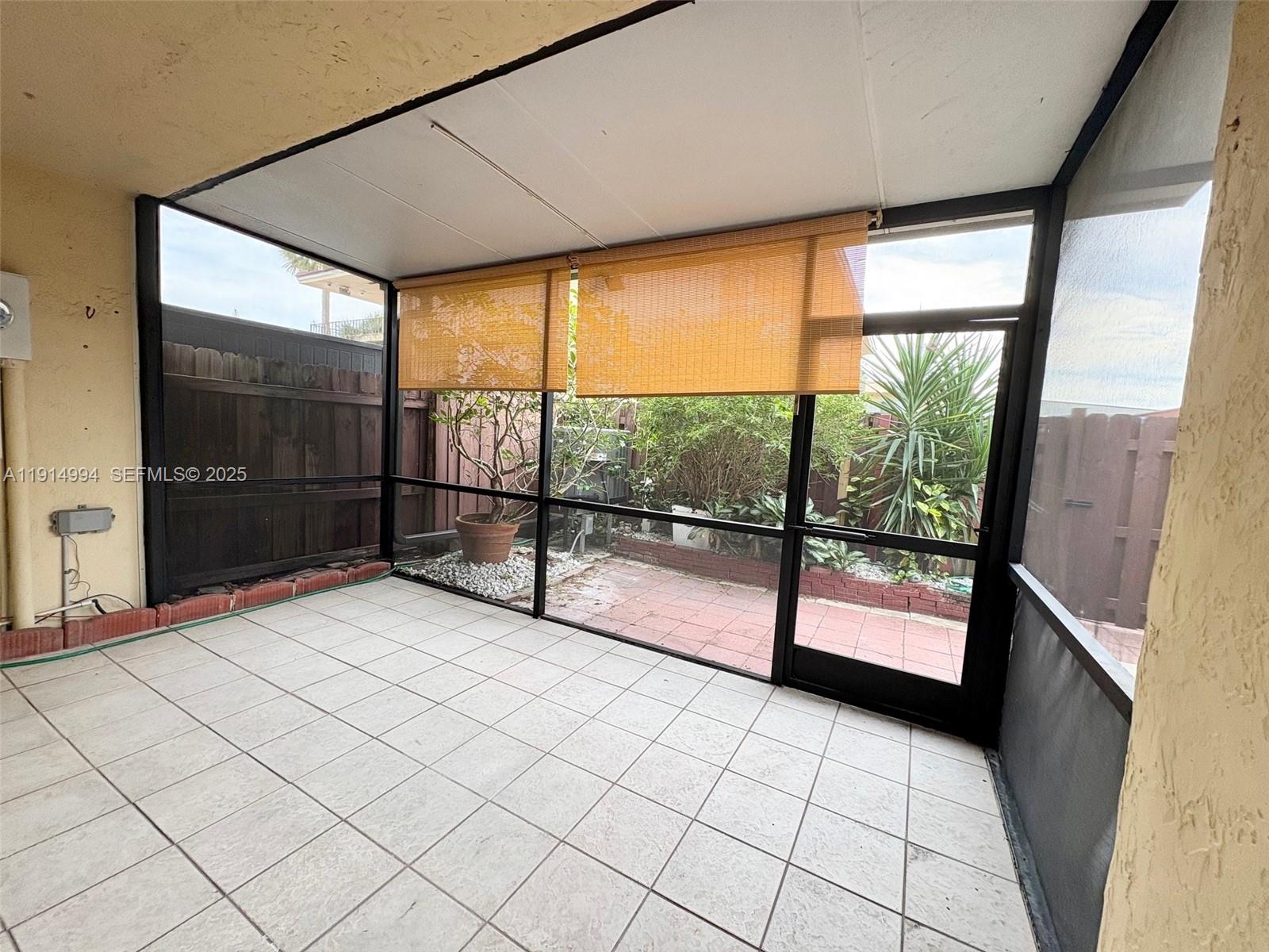 6568 Southwest 41st Place, Unit 151 Davie, FL 33314 - Photo 63 of 65 a view of an empty room and window