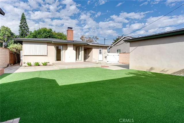a front view of house with yard