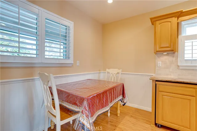 a bedroom with a bed and a table