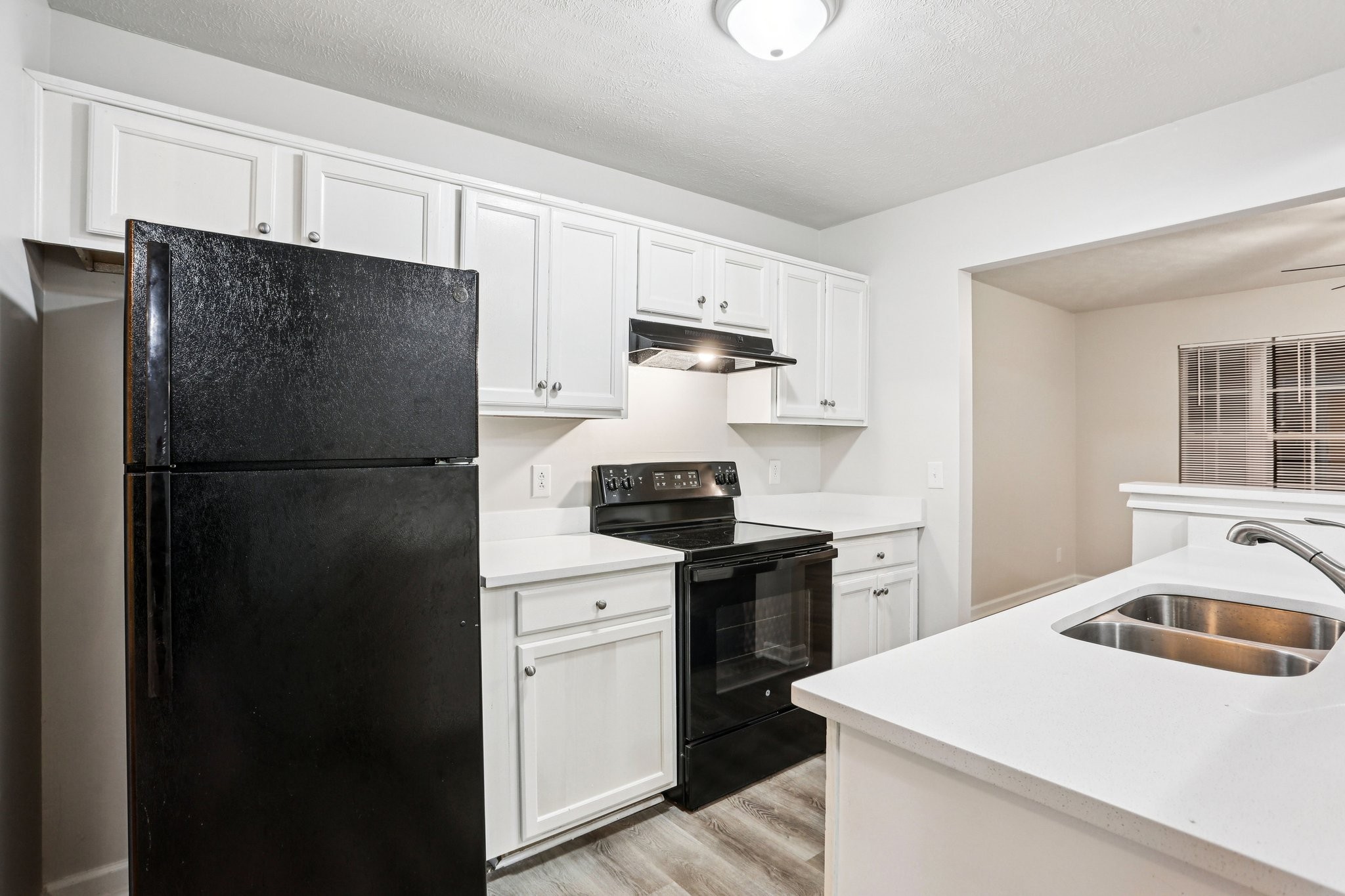 2607 Landrum Court Springfield, TN 37172 - Photo 14 of 30 a kitchen with a refrigerator stove and microwave