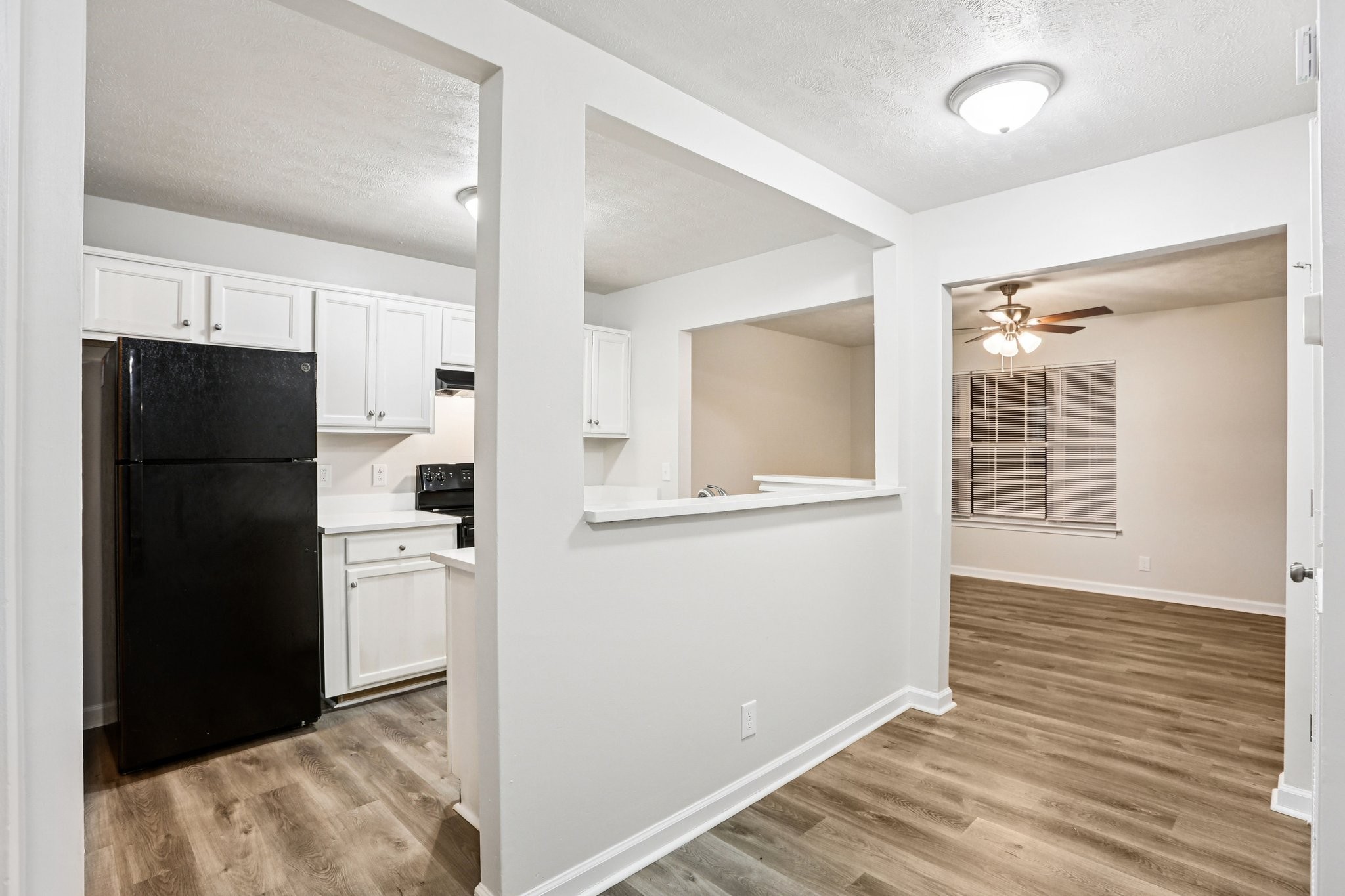 2607 Landrum Court Springfield, TN 37172 - Photo 15 of 30 a view of a kitchen with refrigerator and wooden floor