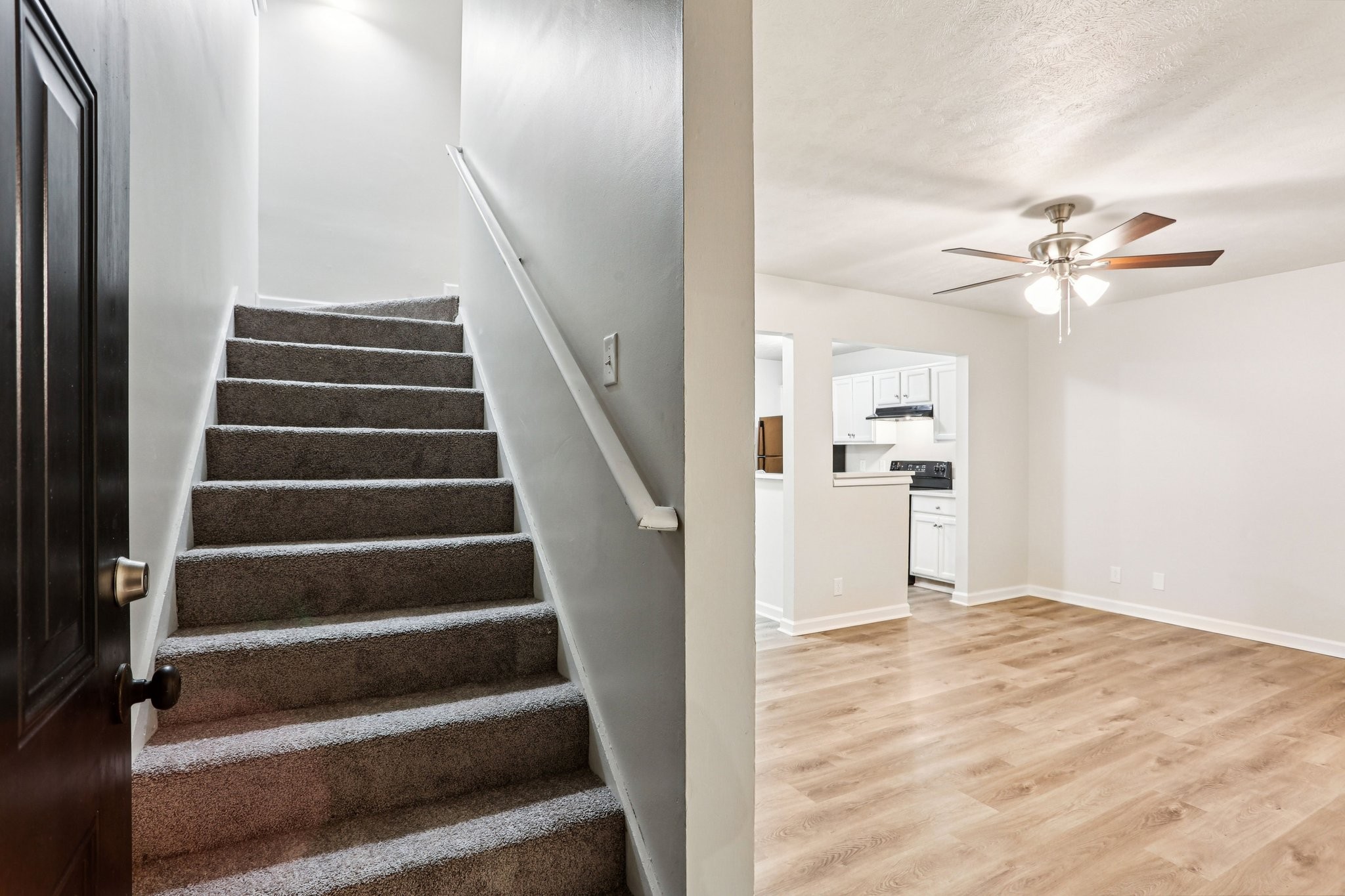 2607 Landrum Court Springfield, TN 37172 - Photo 7 of 30 a view of an entryway with wooden floor and a ceiling fan