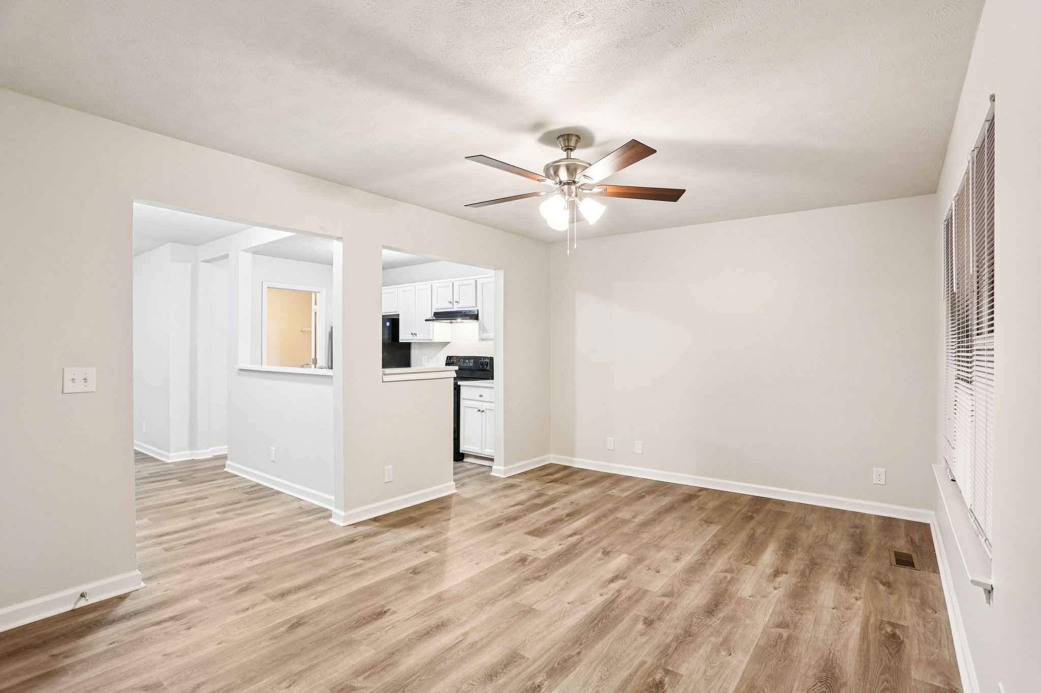 2607 Landrum Court Springfield, TN 37172 - Photo 8 of 30 wooden floor in an empty room with a window