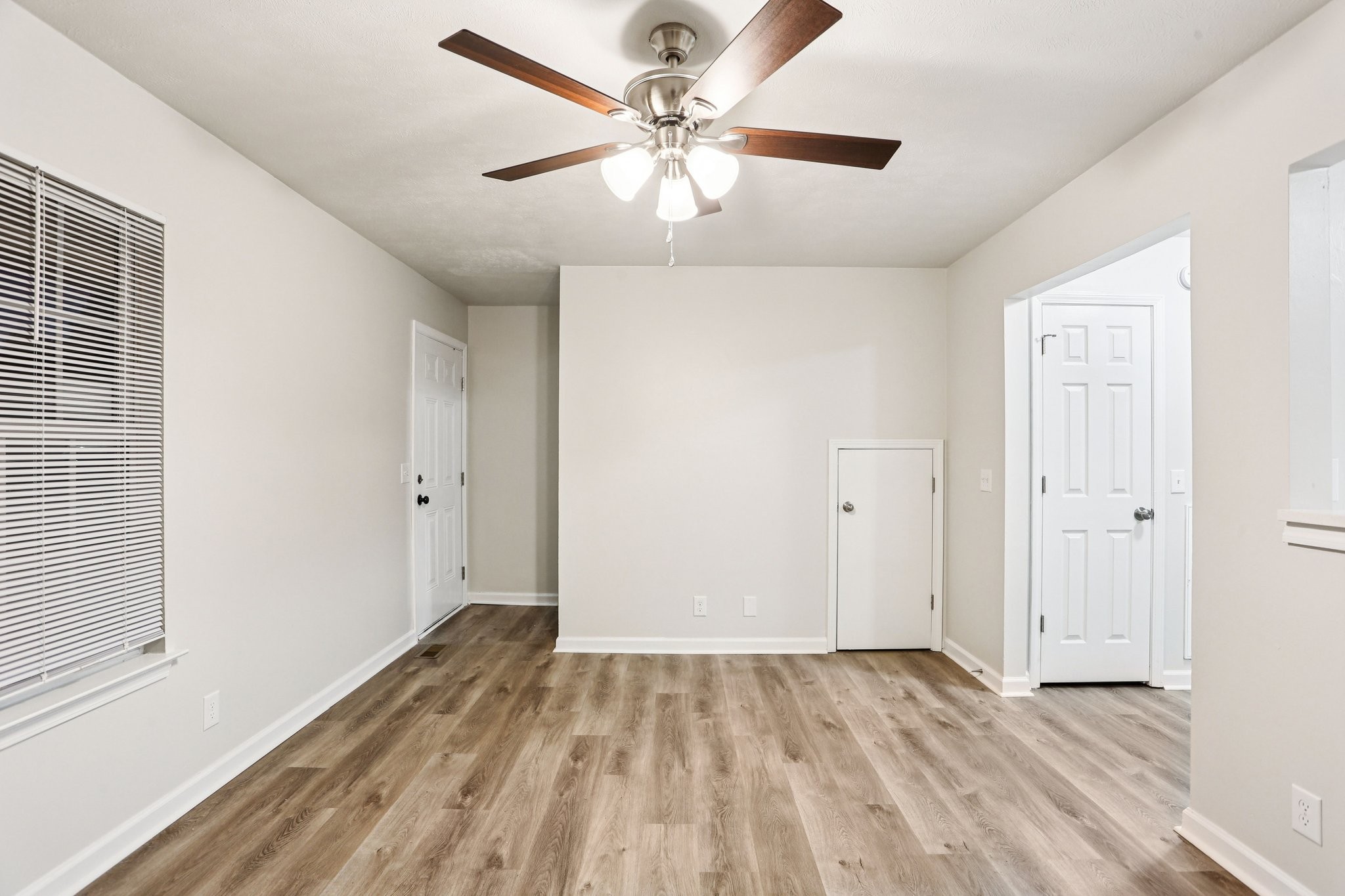 2607 Landrum Court Springfield, TN 37172 - Photo 9 of 30 wooden floor in an empty room with a window
