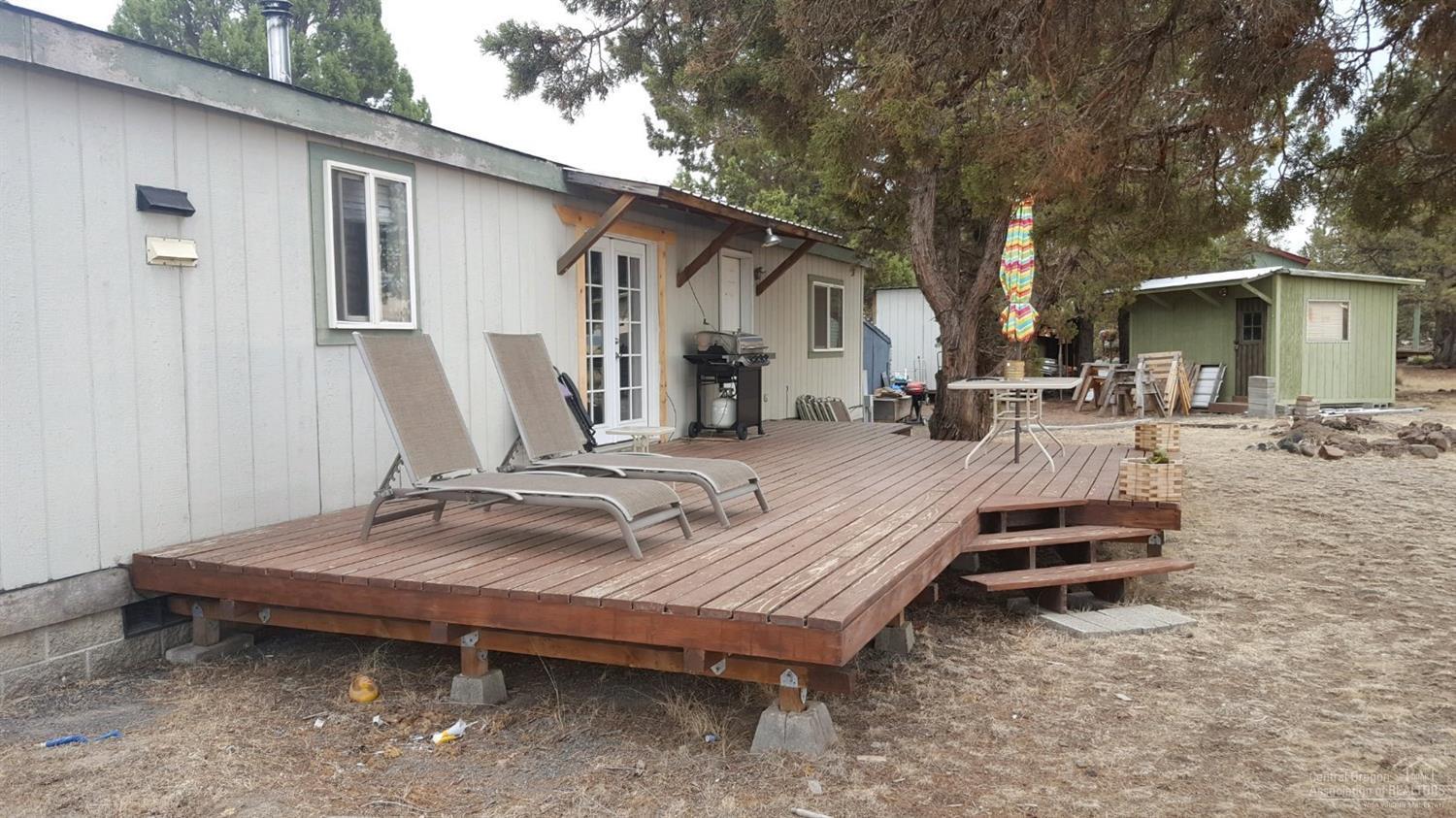 8518 Southwest Crater Loop Road Terrebonne, OR 97760 - Photo 17 of 24 Back Deck & Small Storage Shed.