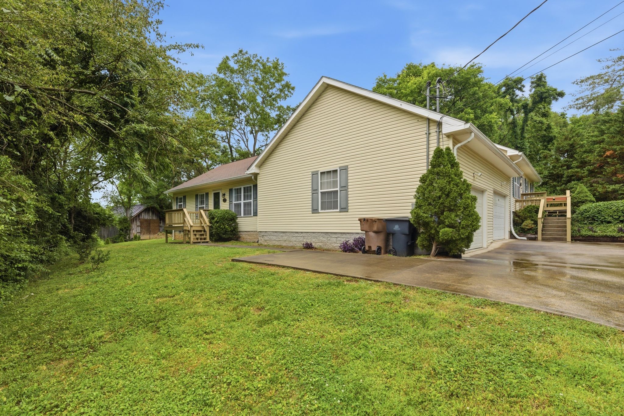 2642 Hibbitts Road Nashville, TN 37214 - Photo 4 of 29 a view of a house with a yard and potted plants