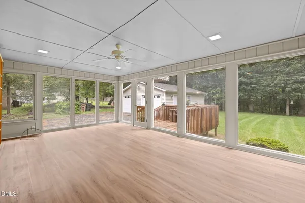 a view of livingroom with furniture and garden view