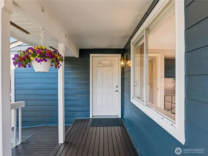 a view of entryway with wooden floor