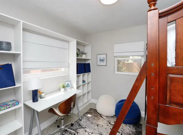 a room with furniture and a wooden floor