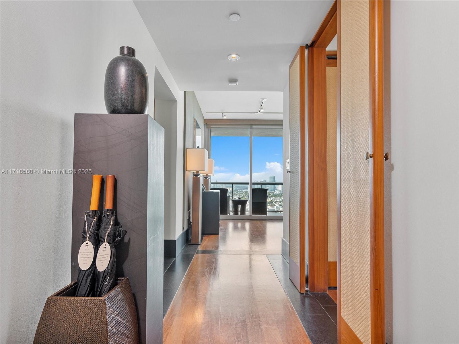 101 20th Street, Unit 3302 Miami Beach, FL 33139 - Photo 21 of 48 a view of a hallway with furniture and a livingroom view