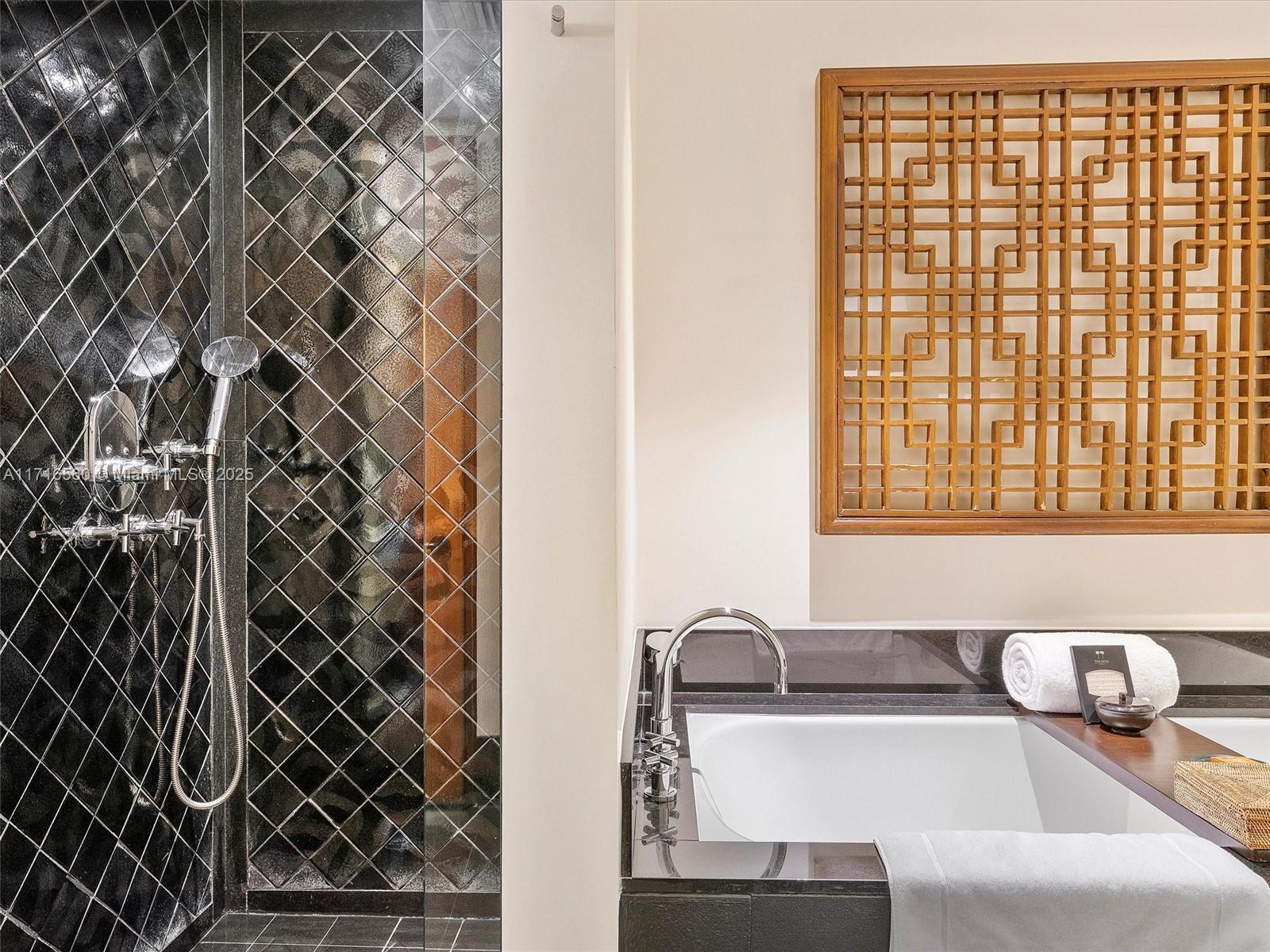 101 20th Street, Unit 3302 Miami Beach, FL 33139 - Photo 34 of 48 a bathroom with a sink and a mirror