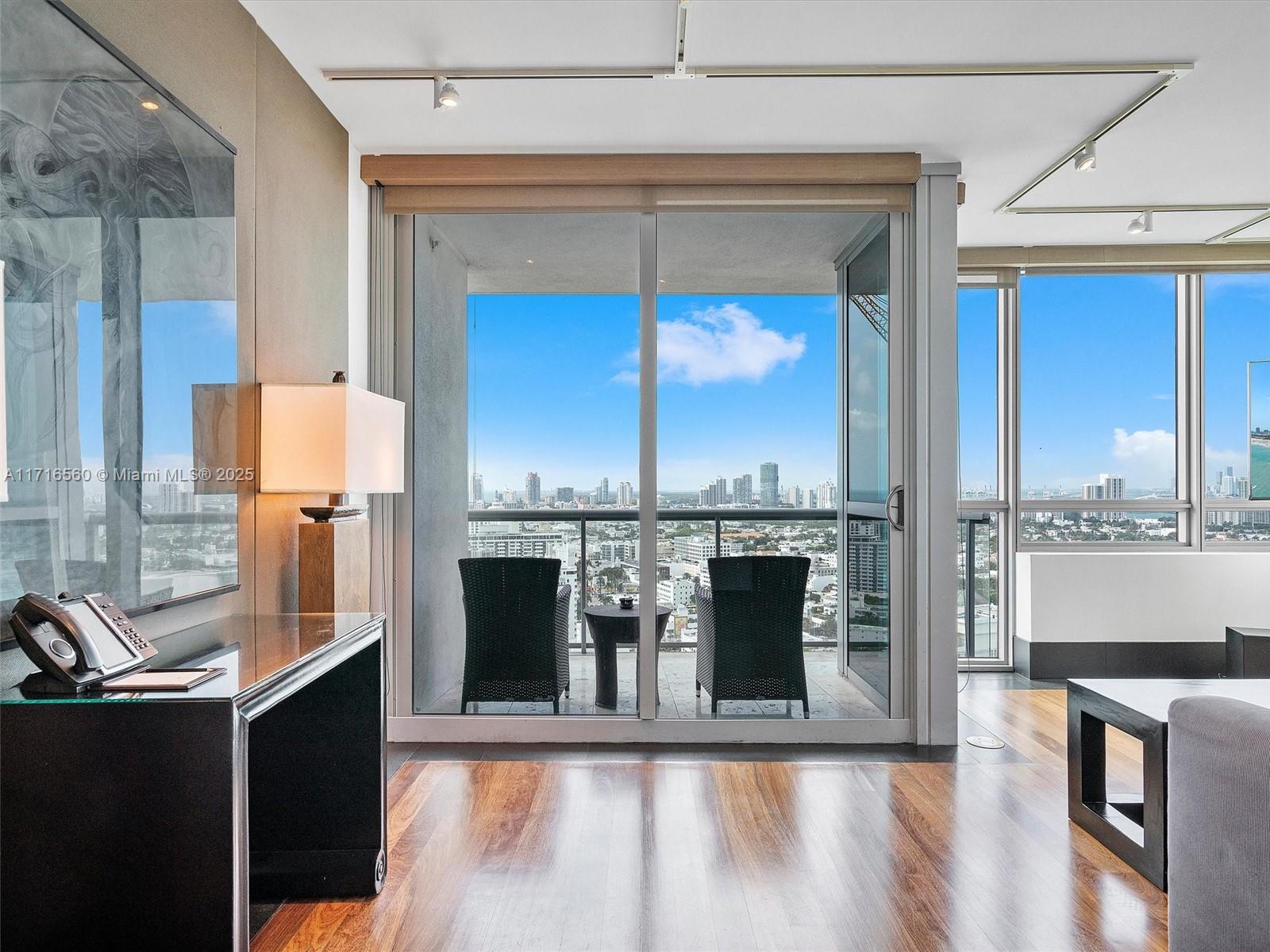 101 20th Street, Unit 3302 Miami Beach, FL 33139 - Photo 5 of 48 a view of a living room with a large window