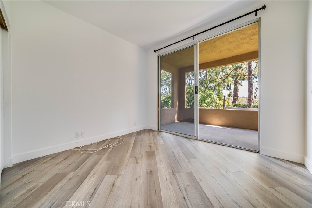 43 Auburn Aisle Irvine, CA 92612 - Photo 15 of 19 Secondary bedroom with direct access to the patio.