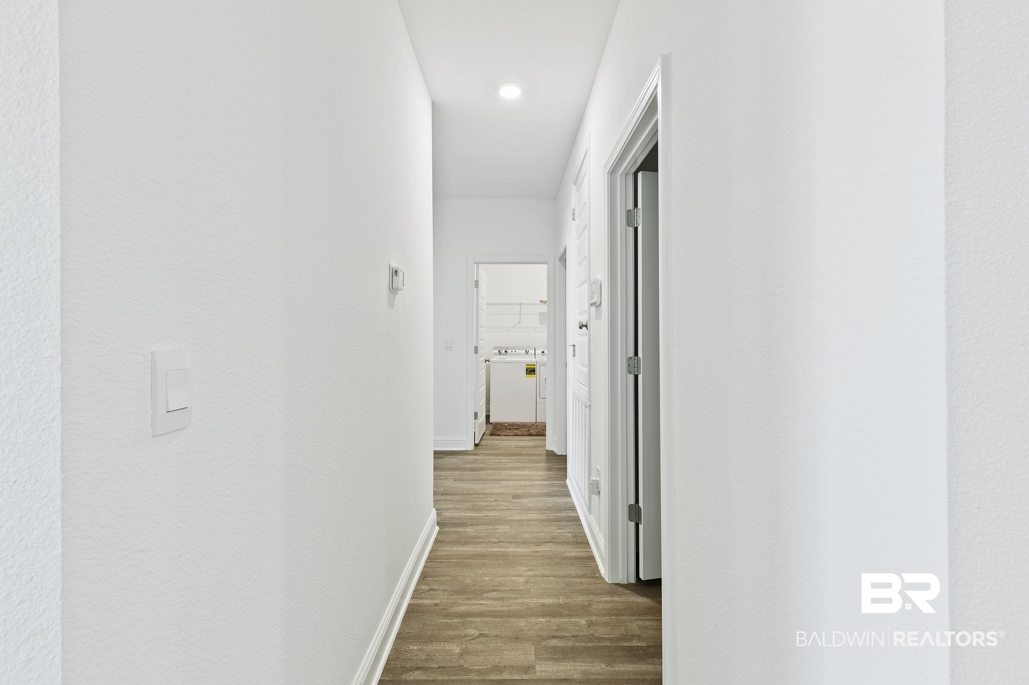 1141 Pencarro Boulevard Foley, AL 36535 - Photo 35 of 70 Hallway featuring light wood-type flooring