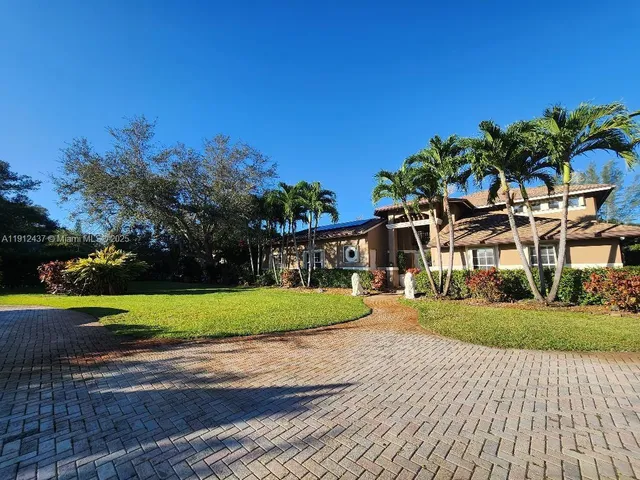 front view of a house with a street