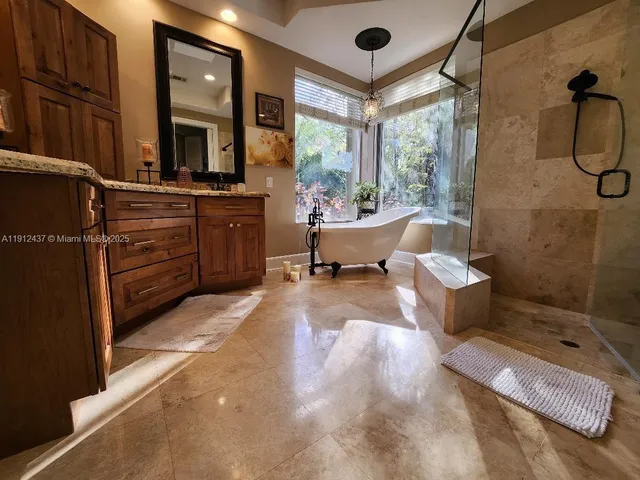 a bathroom with a sink and mirror