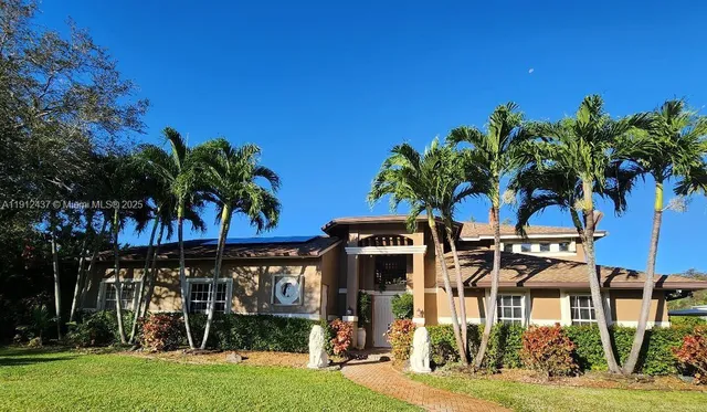 front view of a house with a big yard