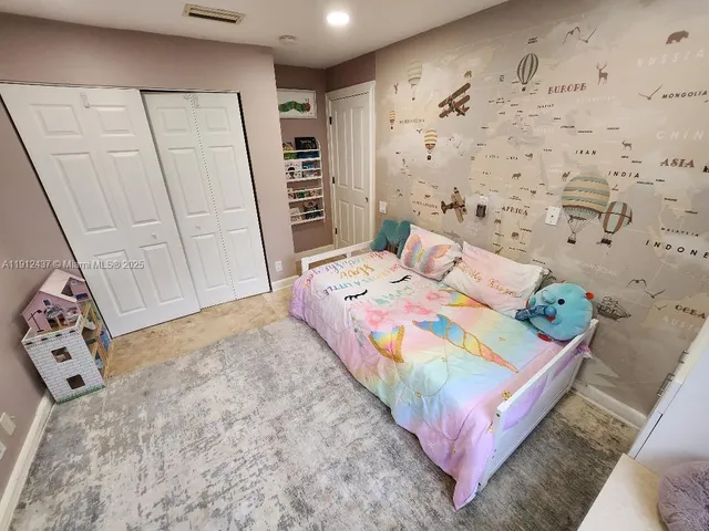 a view of a park with large trees