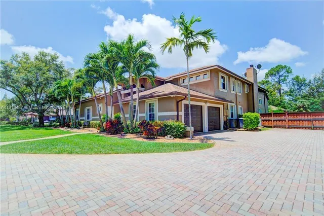 a view of house with swimming pool outdoor seating and living room