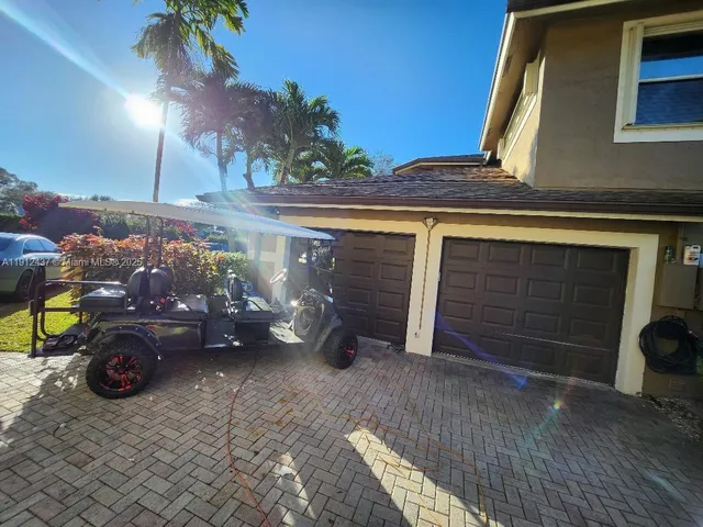 a view of a swimming pool with a patio