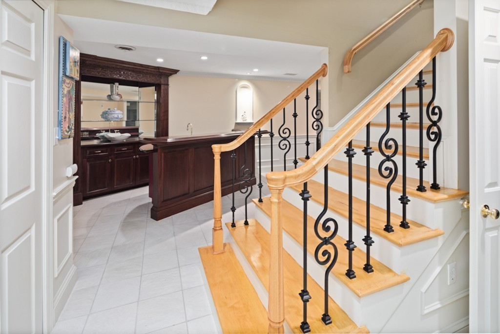 1193 Main Street, Unit D1 Hingham, MA 02043 - Photo 23 of 34 a view of entryway and stairs