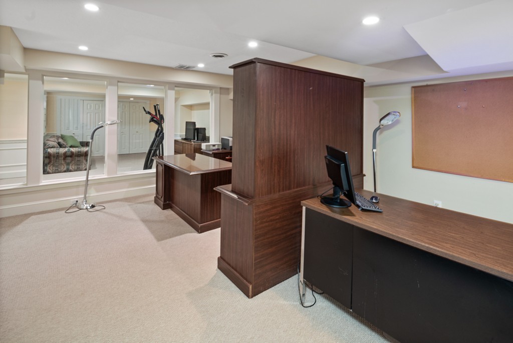 1193 Main Street, Unit D1 Hingham, MA 02043 - Photo 27 of 34 a room with a couch and a flat screen tv