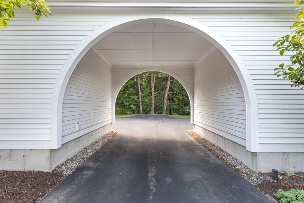 1193 Main Street, Unit D1 Hingham, MA 02043 - Photo 32 of 34 a view of a house with a outdoor space