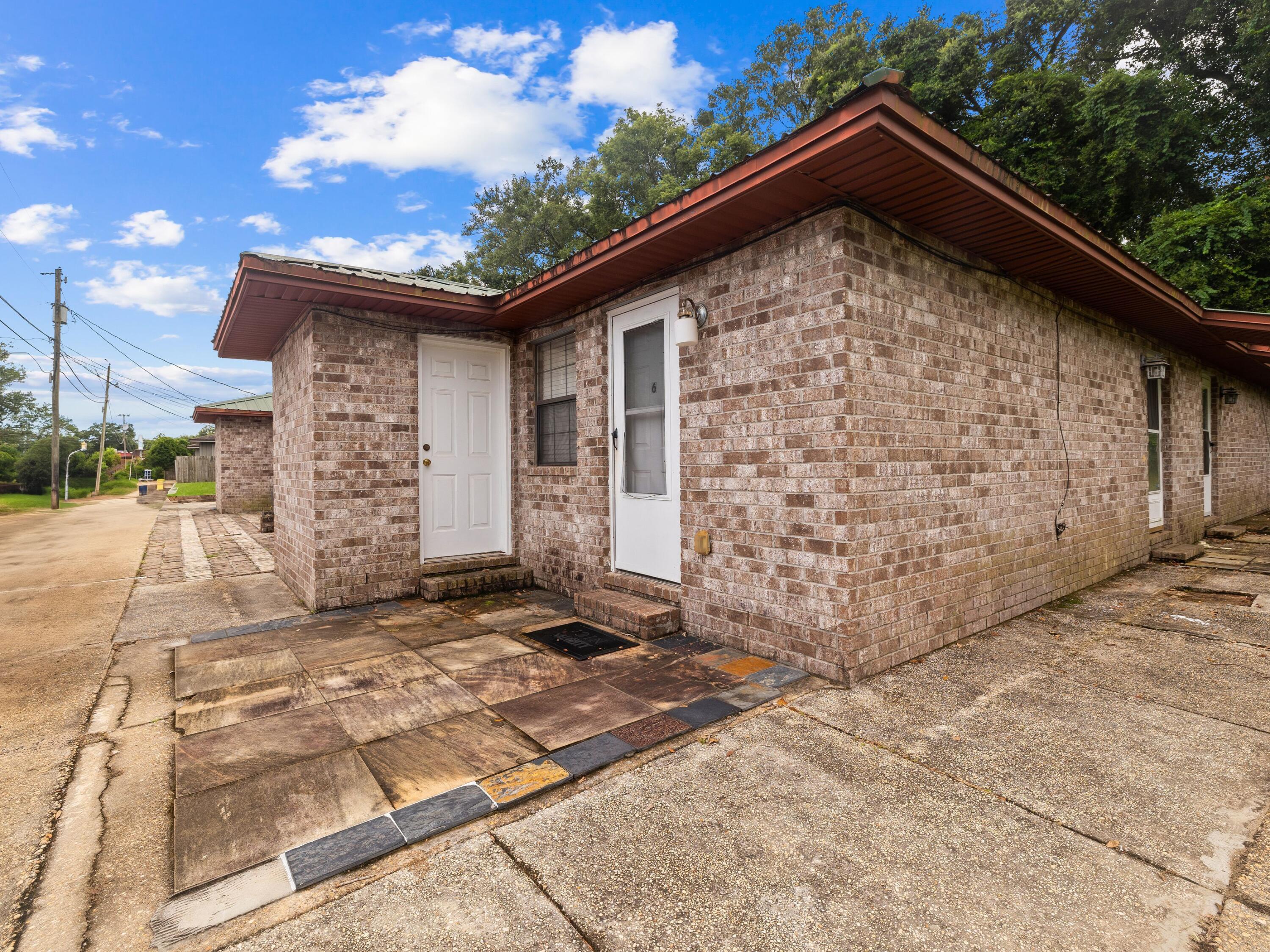 130 East 9 Mile Road, Unit 58 Pensacola, FL 32534 - Photo 13 of 50 a view of a house with a door