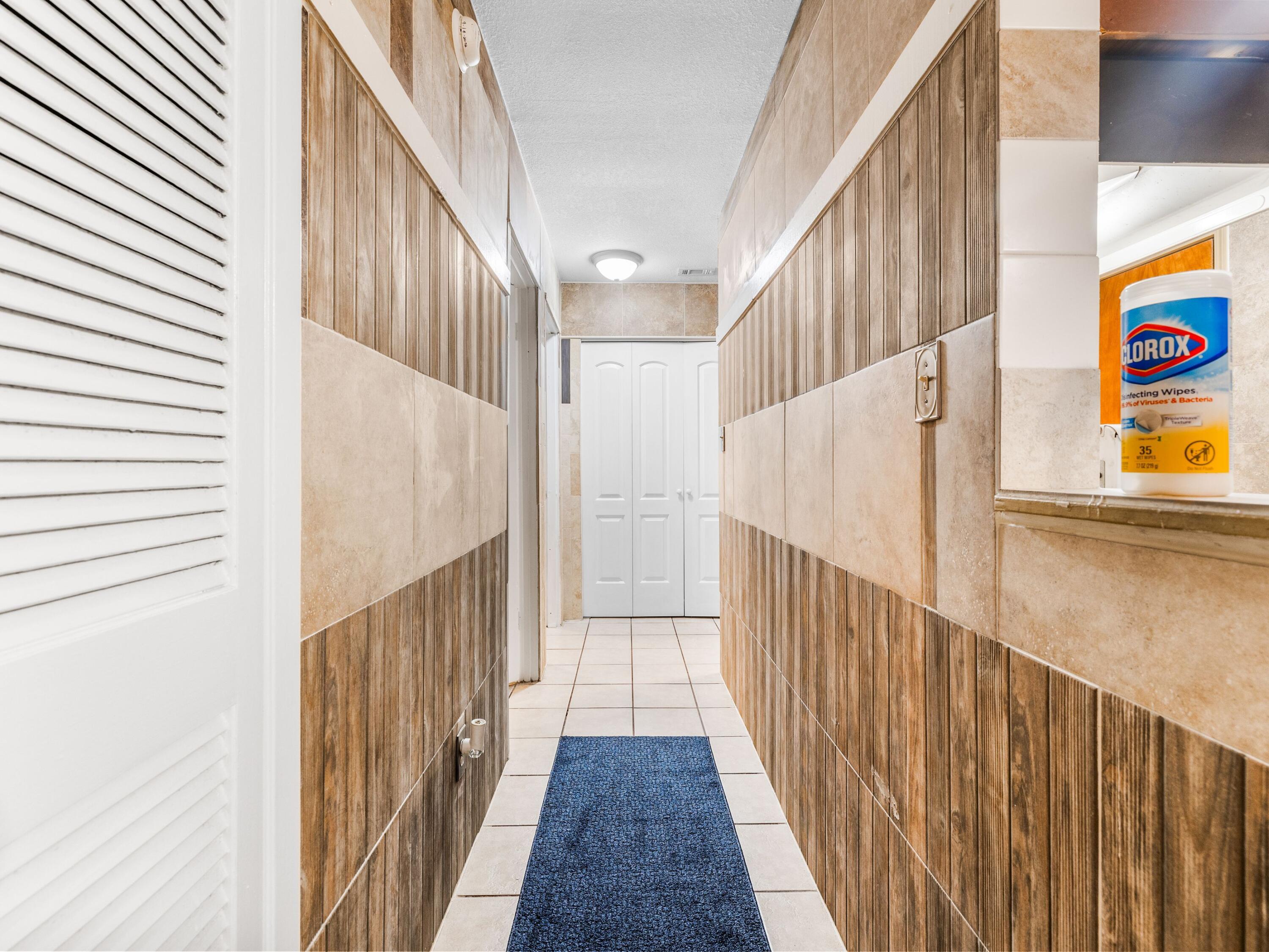 130 East 9 Mile Road, Unit 58 Pensacola, FL 32534 - Photo 26 of 50 a view of staircase with wooden floor and stairs