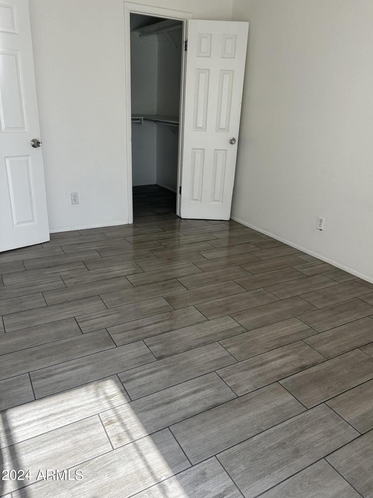 8233 North 34th Drive Phoenix, AZ 85051 - Photo 8 of 11 a view of an empty room