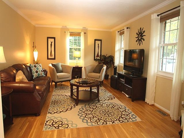 1120 Manchester Drive Raleigh, NC 27609 - Photo 3 of 13 Just off the Foyer is your spacious living room with more beautiful hardwood floors. Living Room