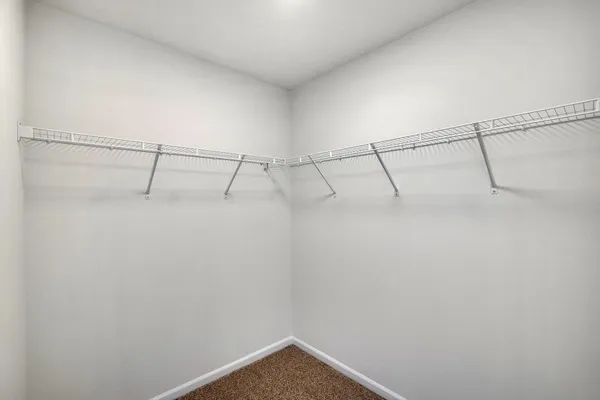 a view of a room with racks on the wall