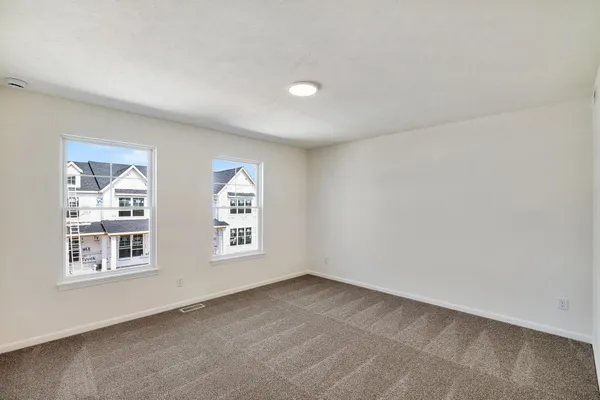 an empty room with windows