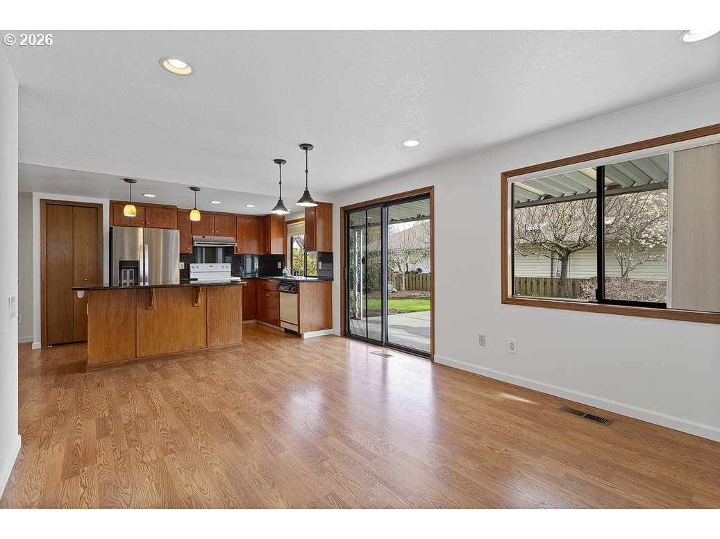 15638 Northeast Russell Place Portland, OR 97230 - Photo 12 of 46 a view of a kitchen with a sink and a large window