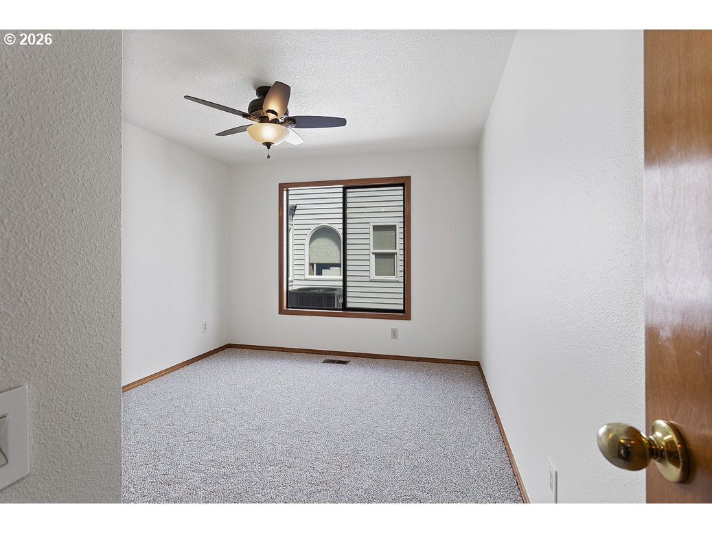 15638 Northeast Russell Place Portland, OR 97230 - Photo 23 of 46 a view of an empty room with a window