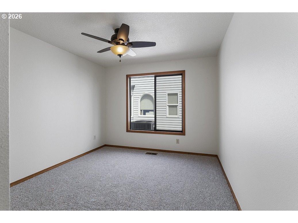 15638 Northeast Russell Place Portland, OR 97230 - Photo 24 of 46 a view of an empty room with a window