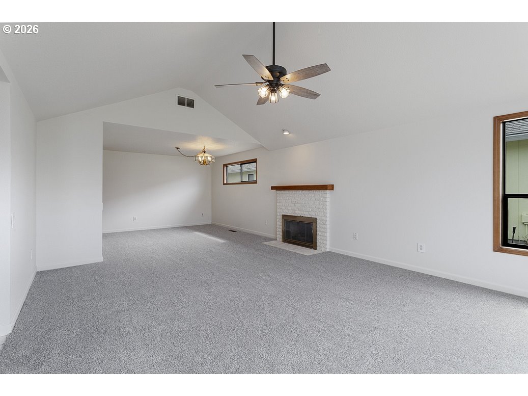 15638 Northeast Russell Place Portland, OR 97230 - Photo 5 of 46 a view of empty room with a ceiling fan