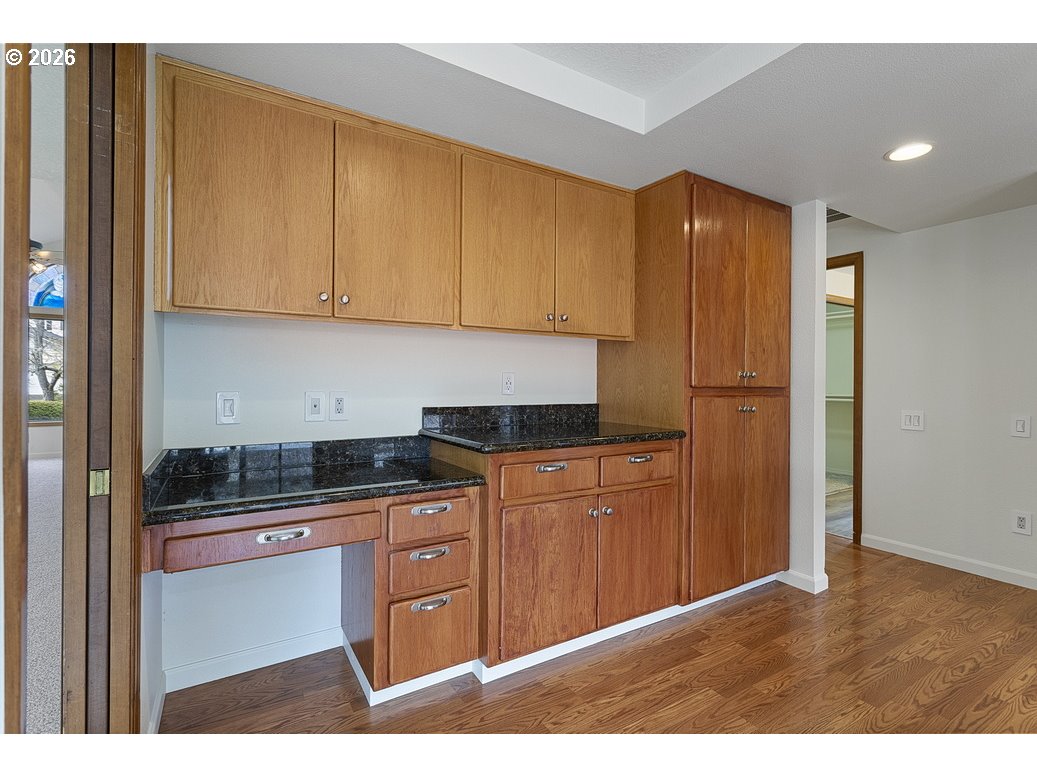 15638 Northeast Russell Place Portland, OR 97230 - Photo 10 of 46 a kitchen with stainless steel appliances granite countertop a refrigerator a stove and a sink