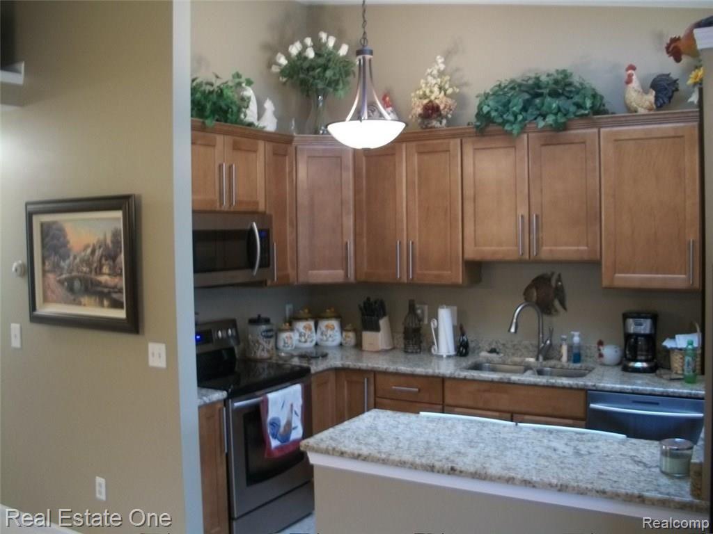 62402 Raleigh Court, Unit 2 South Lyon, MI 48178 - Photo 10 of 45 100_5140.JPG