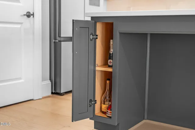 a bathroom with a double vanity sink and mirror