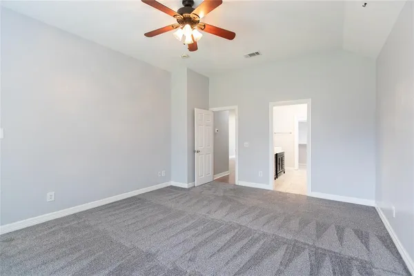 a view of an empty room and window