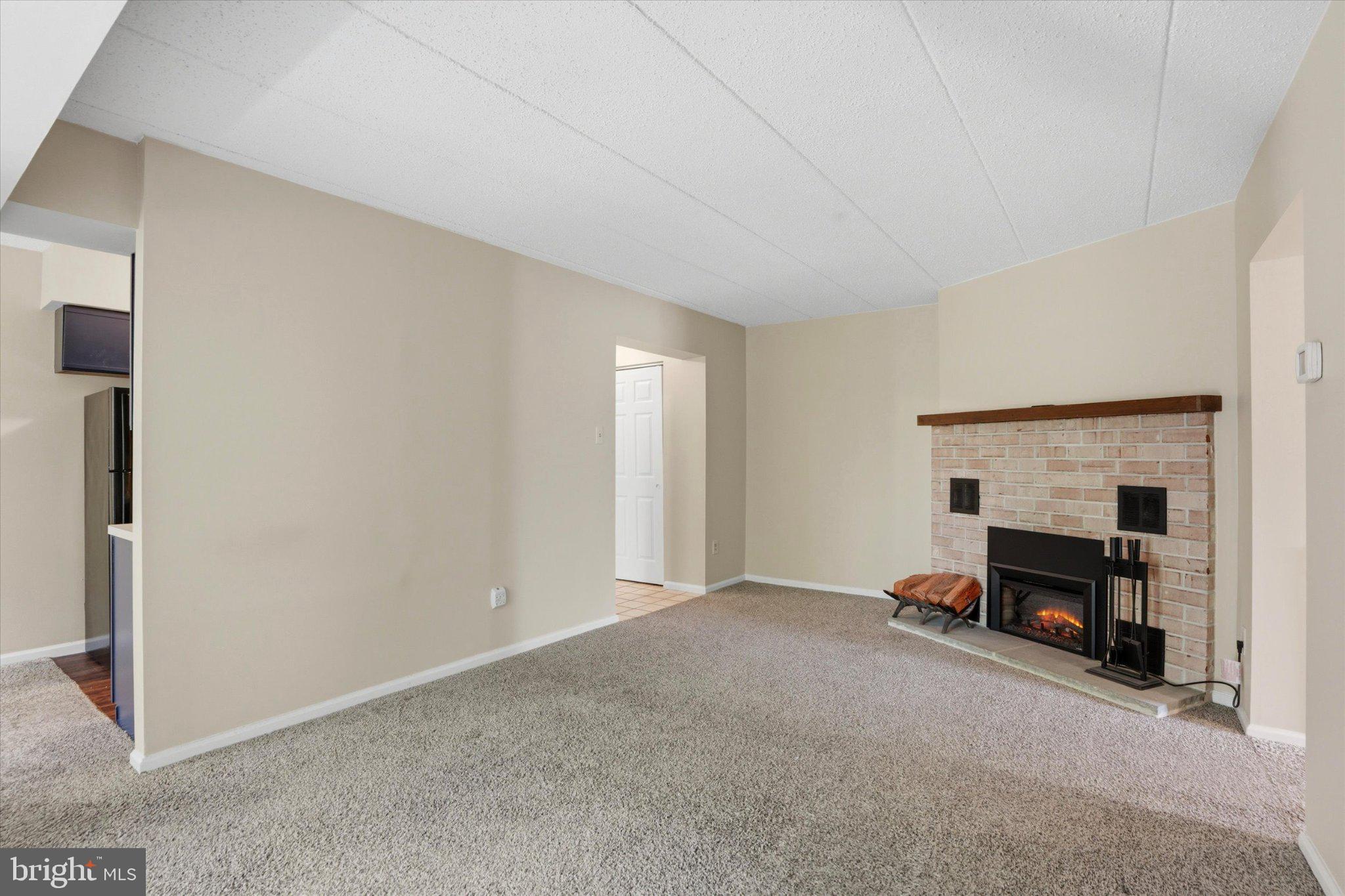 623 Washington Place Chesterbrook, PA 19087 - Photo 11 of 26 a view of a livingroom with furniture and a fireplace