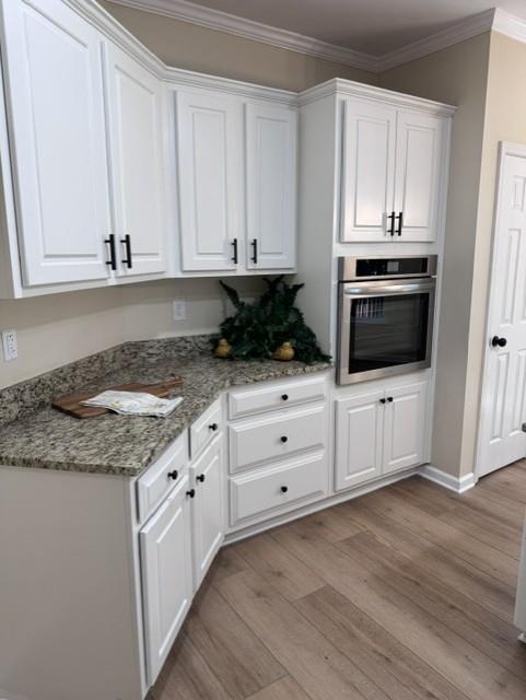 4055 Vista Point Lane Suwanee, GA 30024 - Photo 16 of 42 a kitchen with granite countertop a stove a sink and a microwave