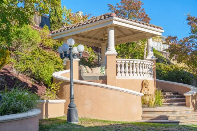 a bedroom with a bed and cabinet