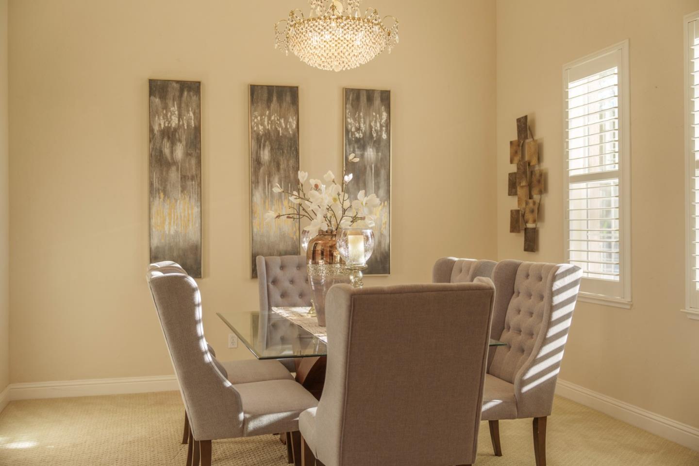 4800 Shady Meadows Place San Jose, CA 95138 - Photo 34 of 89 a view of a dining room with furniture and chandelier