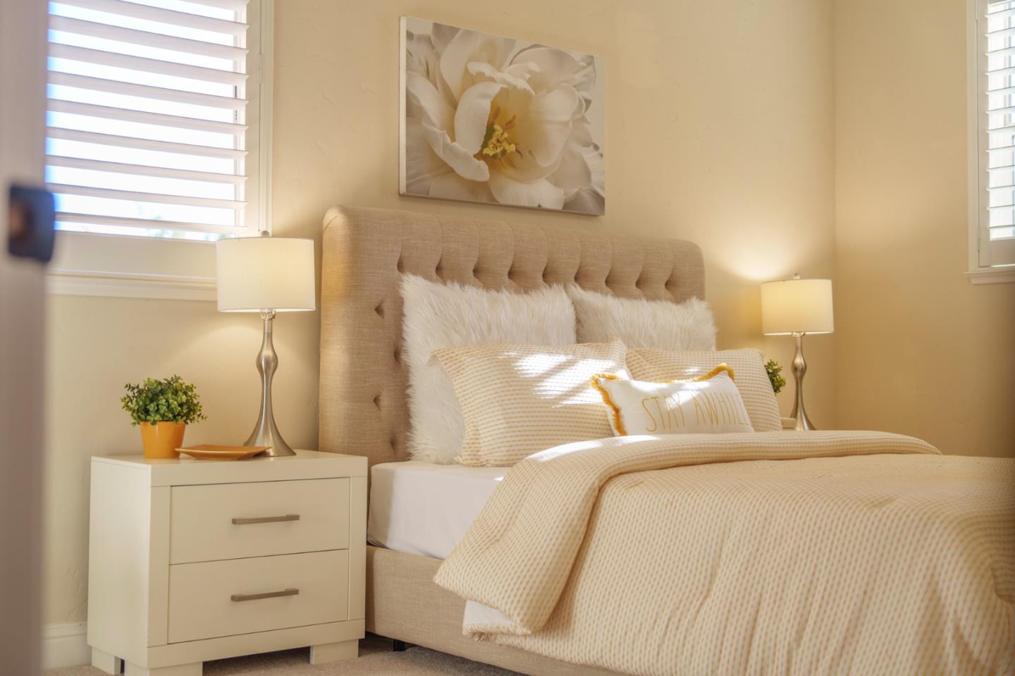 4800 Shady Meadows Place San Jose, CA 95138 - Photo 38 of 89 a bedroom with a bed and cabinet