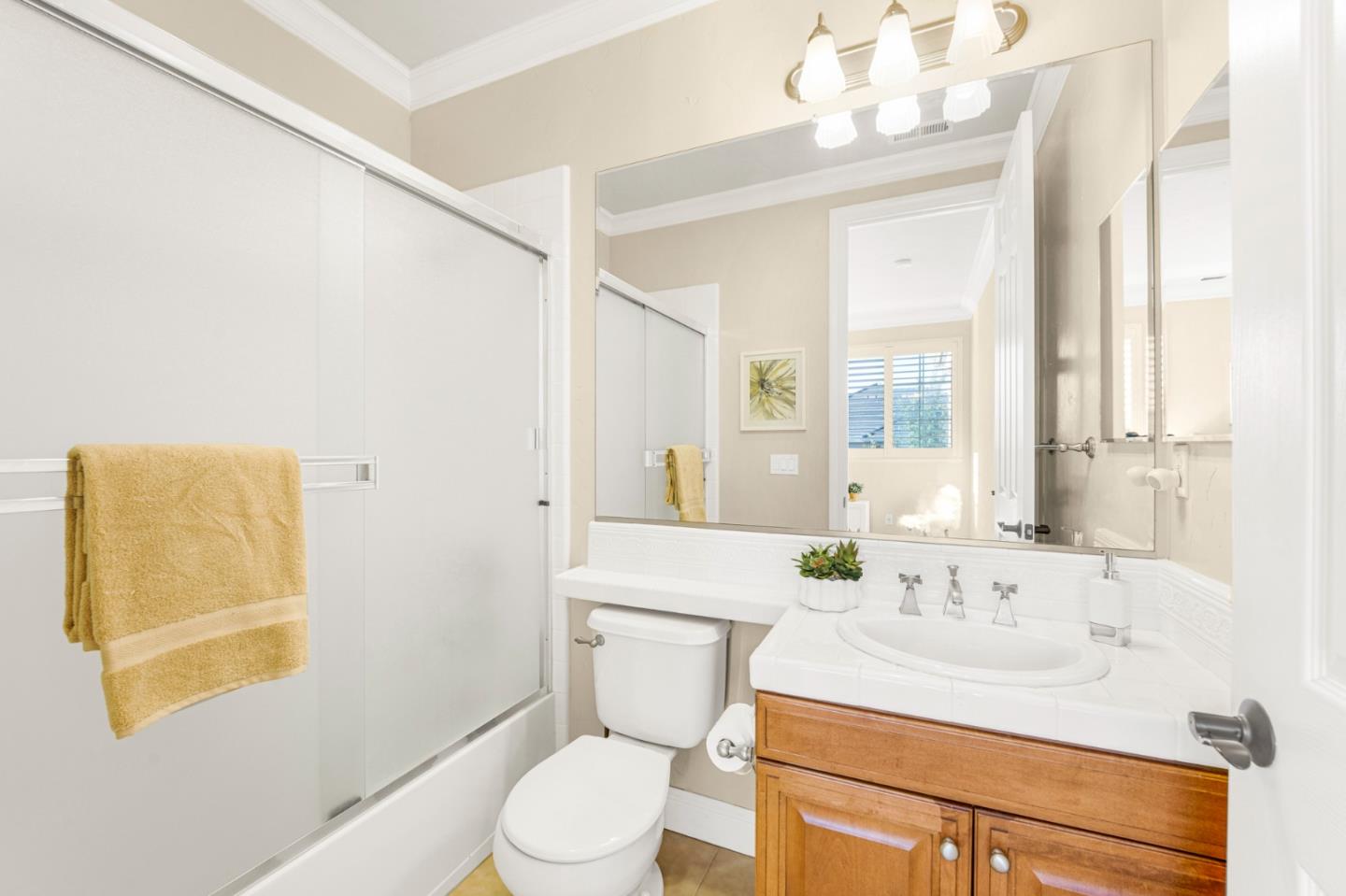 4800 Shady Meadows Place San Jose, CA 95138 - Photo 61 of 89 a bathroom with a sink vanity mirror and toilet