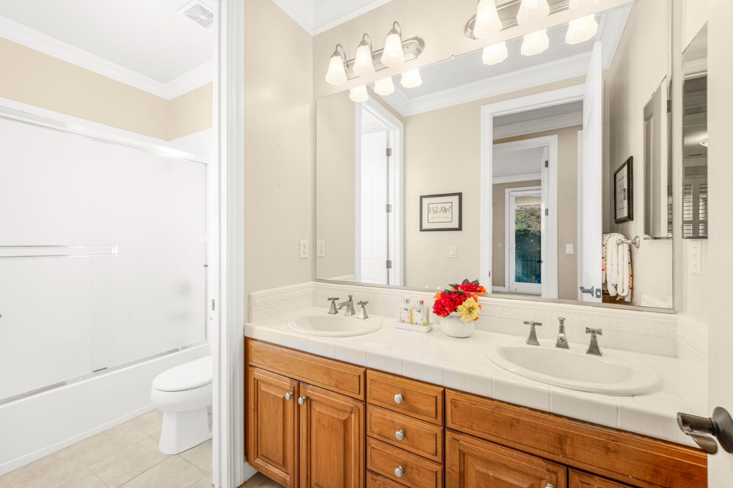 4800 Shady Meadows Place San Jose, CA 95138 - Photo 63 of 89 a bathroom with a double vanity sink mirror double vanity and bathtub