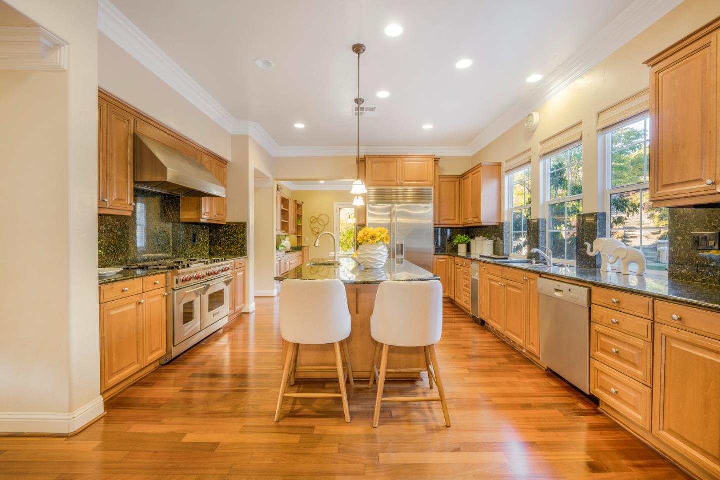 4800 Shady Meadows Place San Jose, CA 95138 - Photo 73 of 89 a large kitchen with a table and chairs