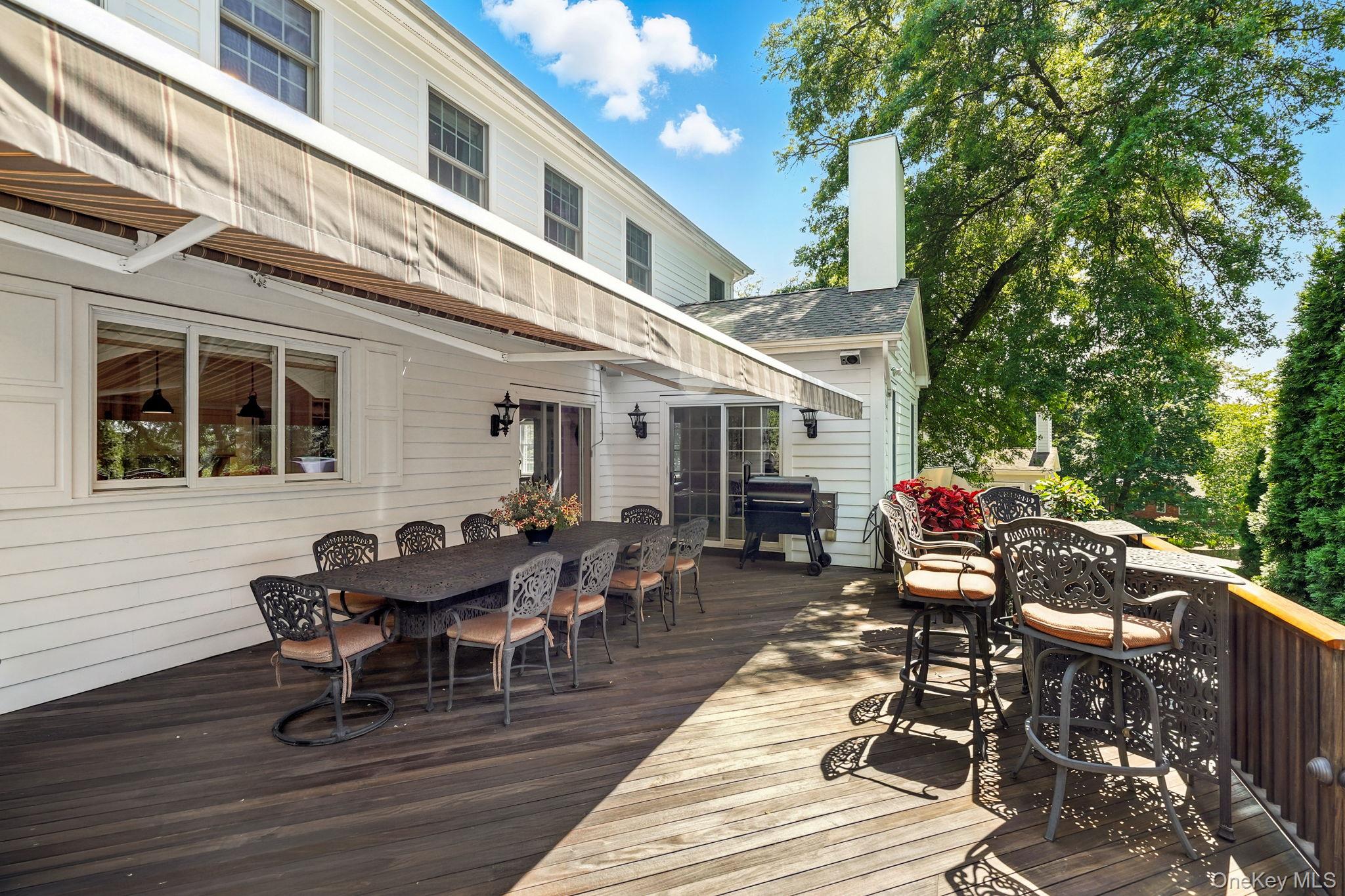 33 Hevelyne Road Elmsford, NY 10523 - Photo 37 of 43 Deck featuring outdoor dining space